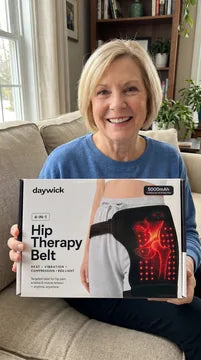 Customer holding the Daywick Hip Therapy Belt box after delivery